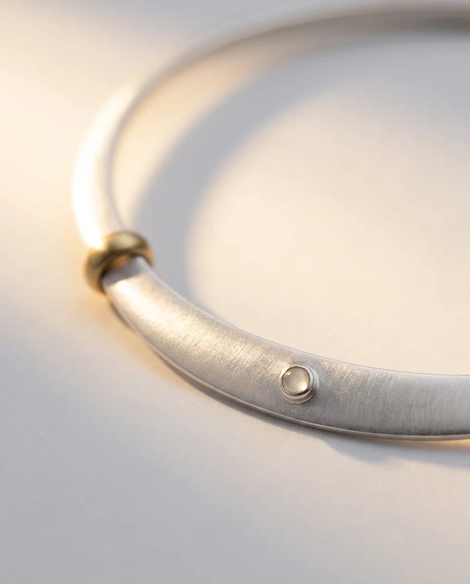 Meander Choker — macro of the satin finish along the bent line